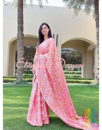 Peach Gharchola Bandhani saree with traditional Gujarati tie dye