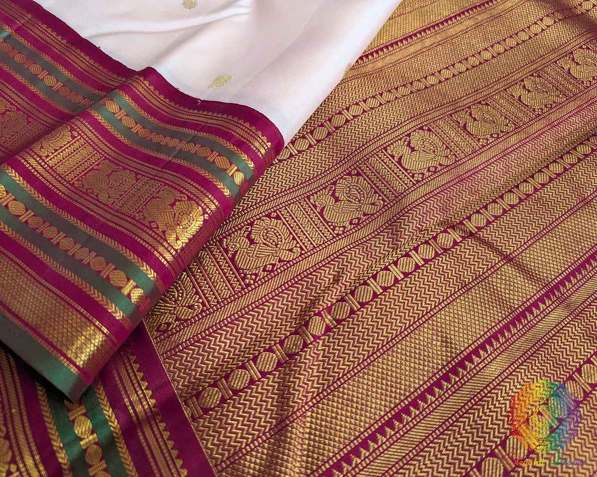 Off white handwoven Kanjivaram silk saree green red pallu alternate view