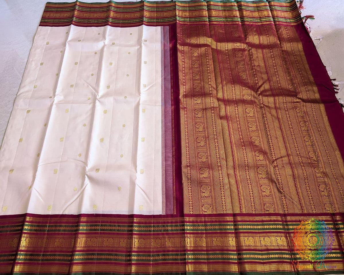 Off white Kanjivaram silk saree open view showing full drape