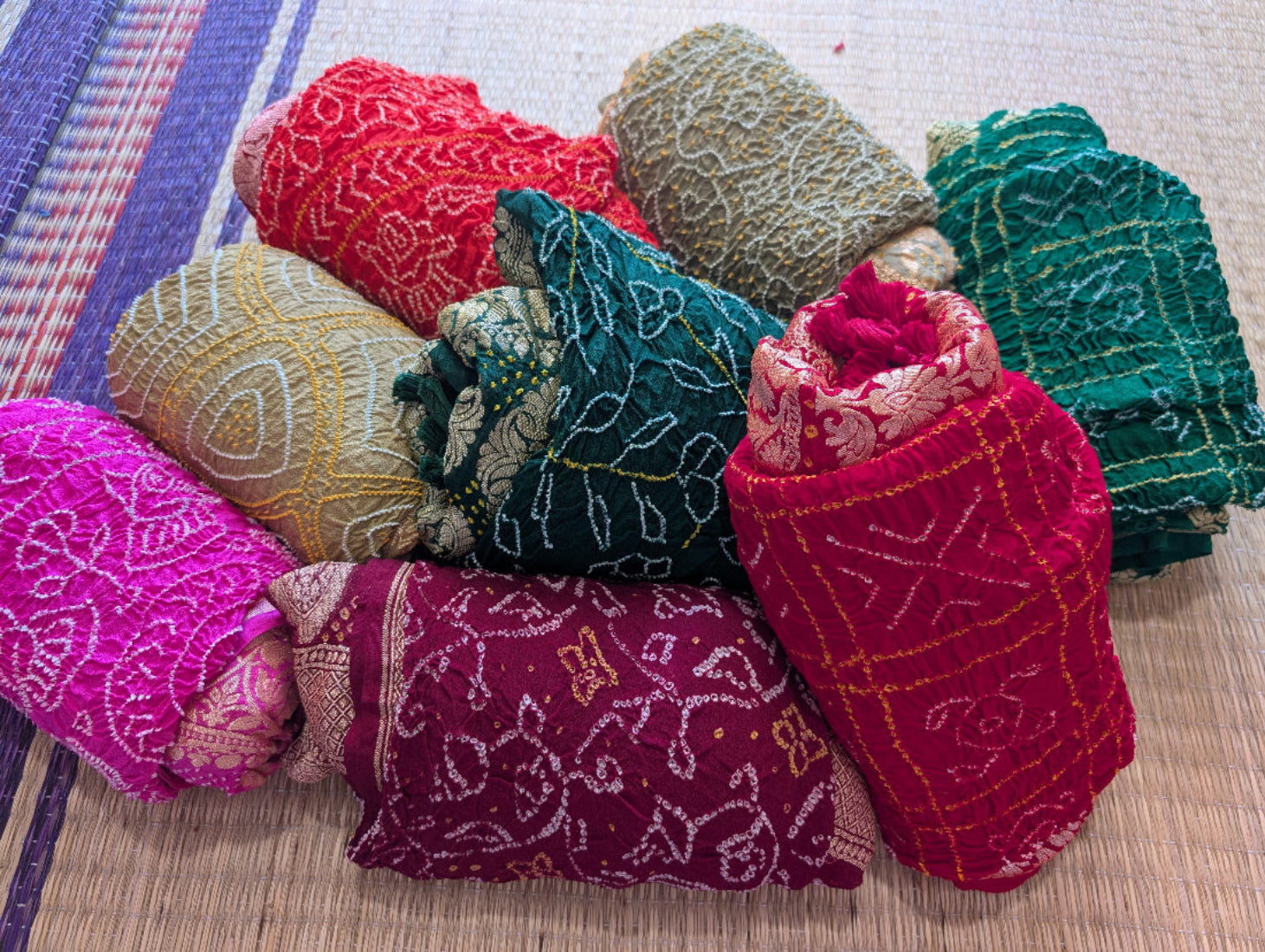 neatly folded bandhani dupattas